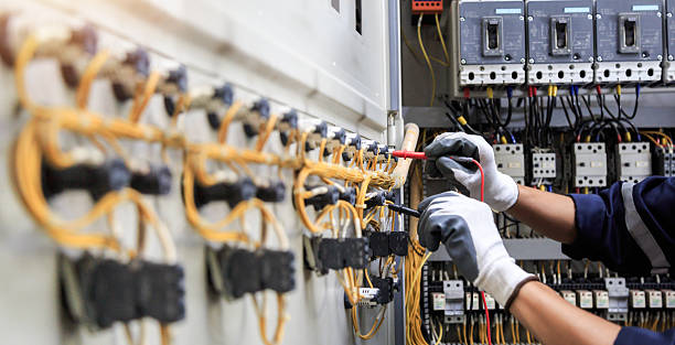 Professional Electrician technician working in Valley Falls, RI
